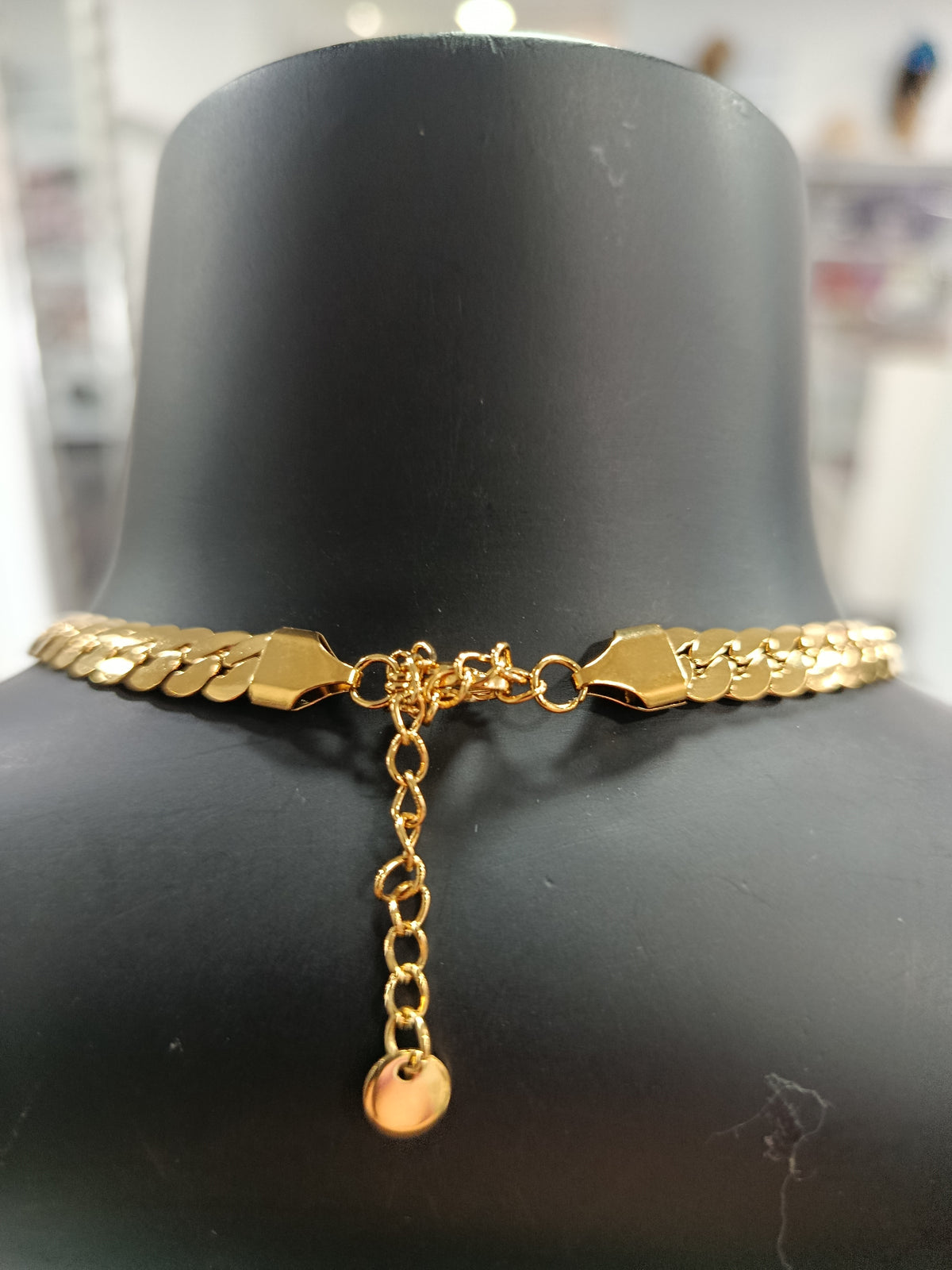 Gargantilla semirrígida acero dorado