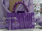 Bolso con asa bolas morado