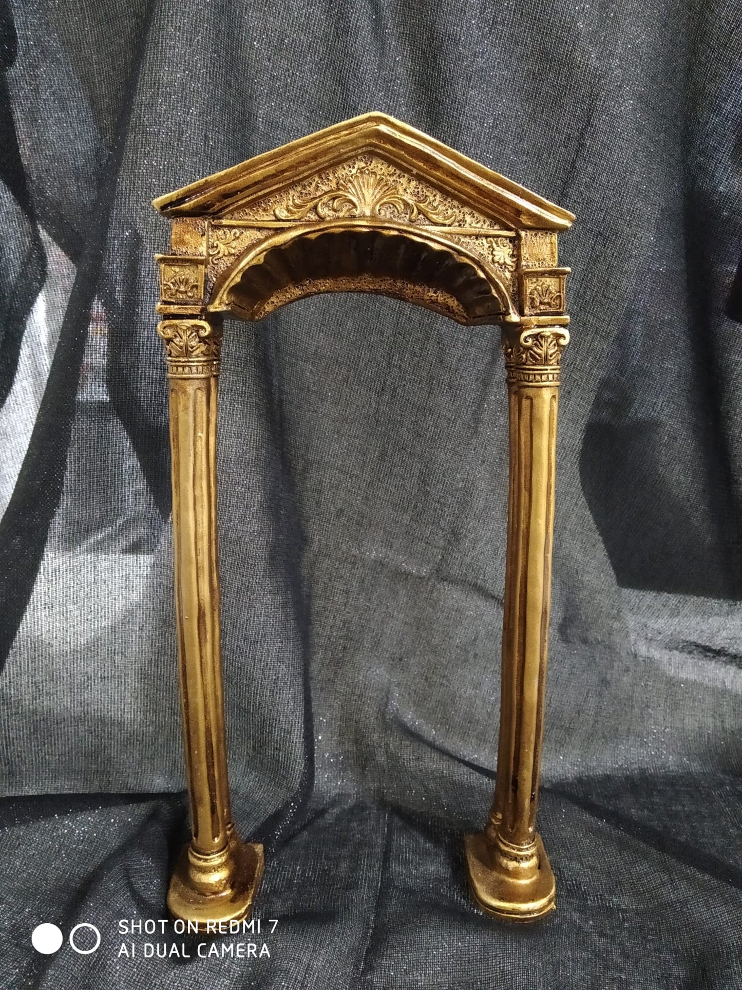 Figura Arco dorado 26cm.