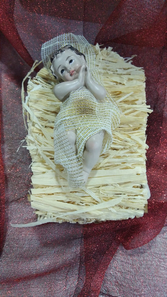 Figura religiosa nacimiento Niño Jesús en cuna 9 cm.