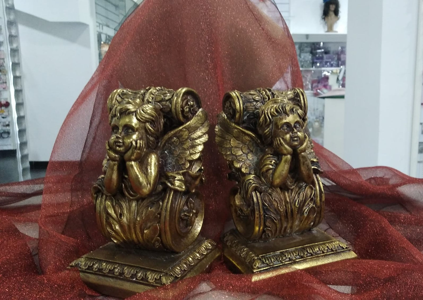 Decoración Set sujetalibros ángeles dorados.