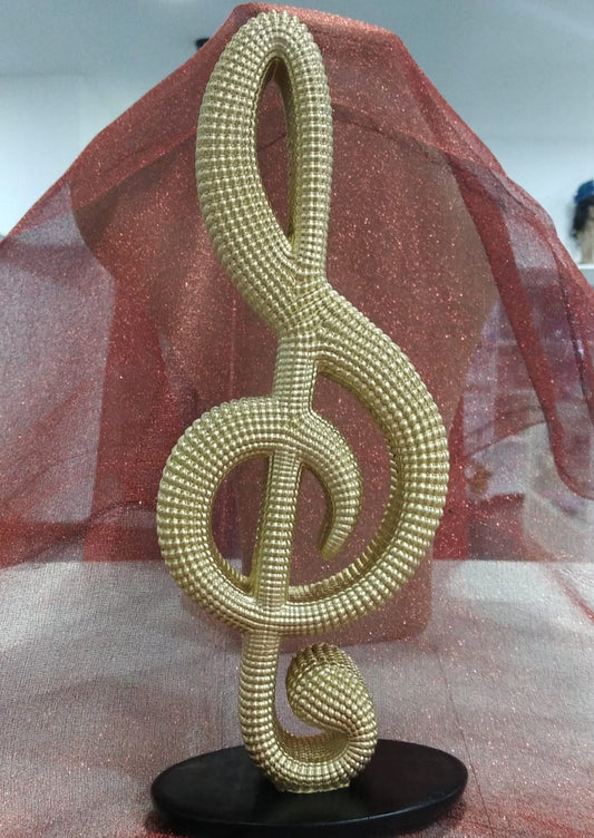 Decoración Clave sol dorada 26 cm.