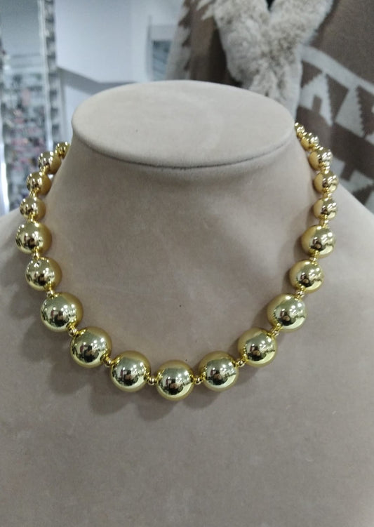 Collar acero bolas doradas