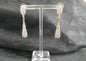 Pendientes firma lágrima cristal metal dorado