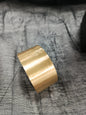 Brazalete acero dorado mate rígido