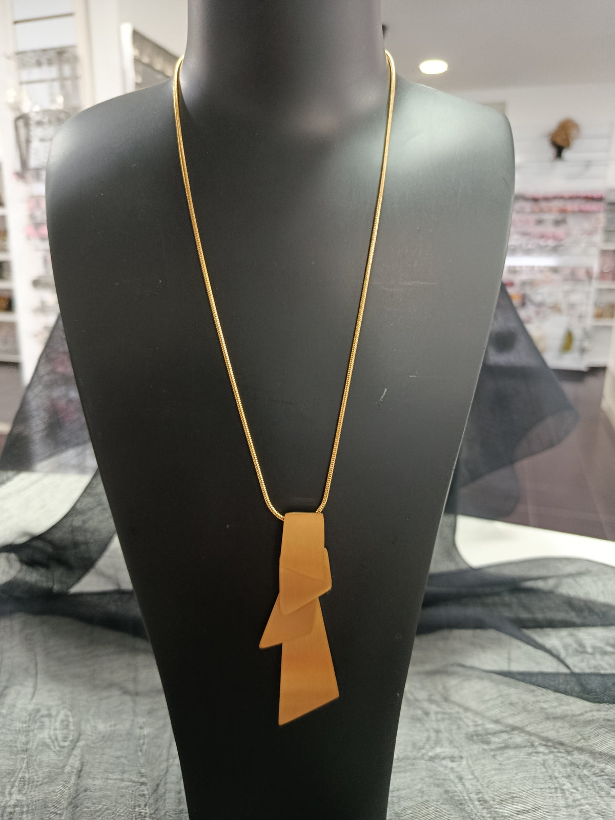 Colgante acero dorado ajustable