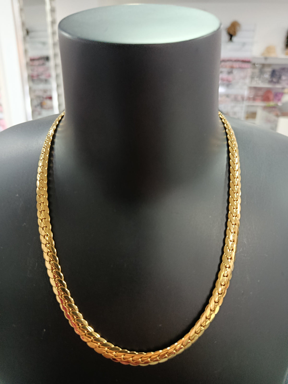 Gargantilla semirrígida acero dorado