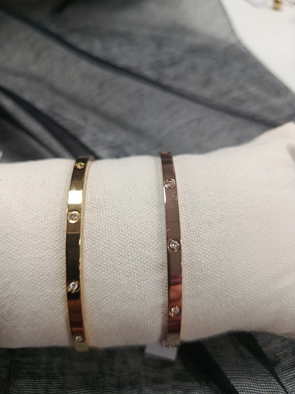 Pulsera, brazalete, rígido cerrado, dorado, plateado y dorado rosa con cristal, Moments